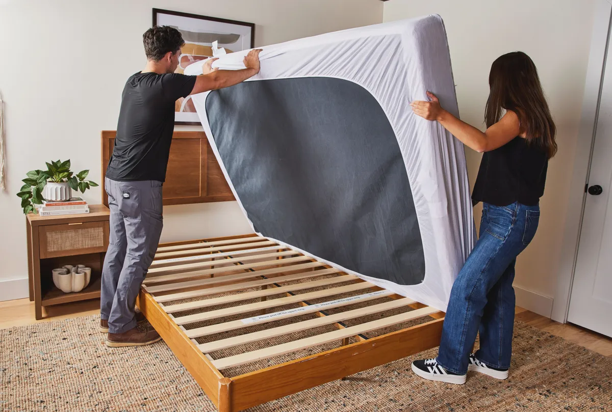 A clean spare room prepared for storing a mattress flat on the floor