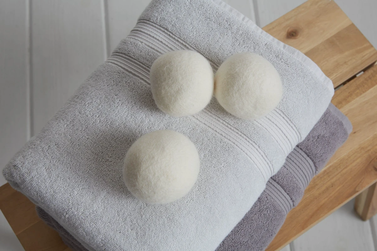 Three wool dryer balls - a reusable alternative to tennis balls