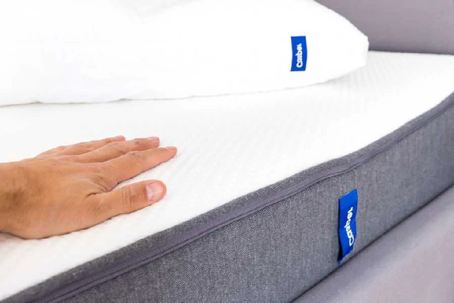 A low profile box spring keeps a thick hybrid mattress at a comfortable bed height