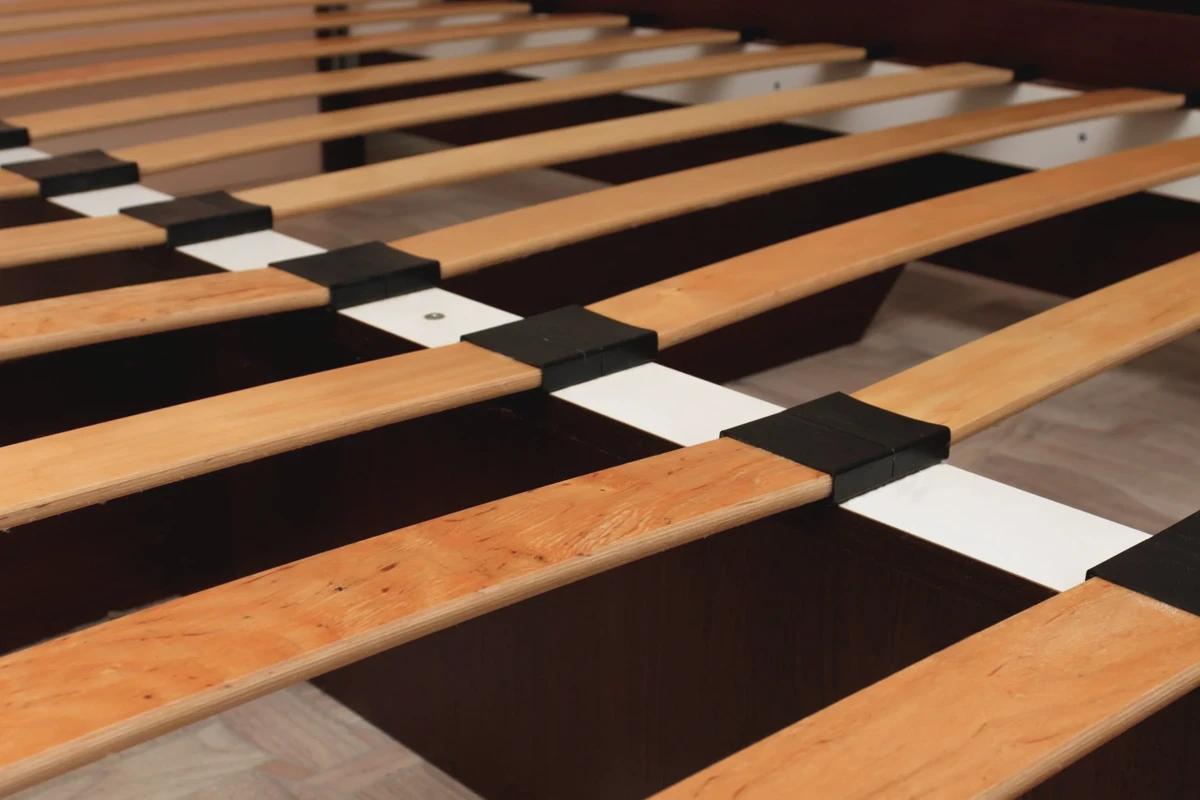 Bed frame slats supporting a mattress
