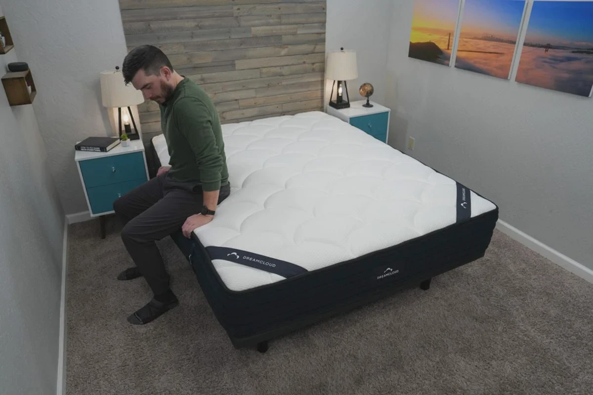 Side view of a DreamCloud hybrid mattress showing edge support