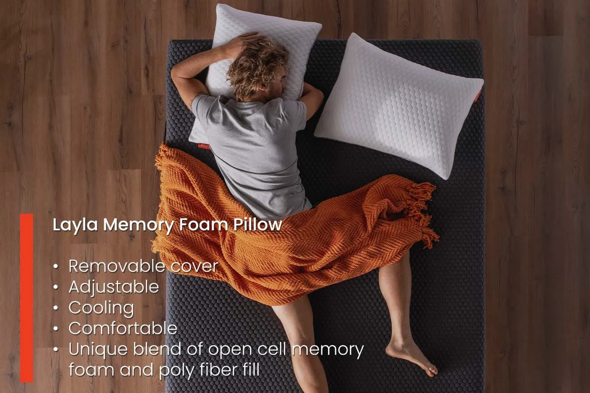 Person folding a memory foam pillow to test if it springs back