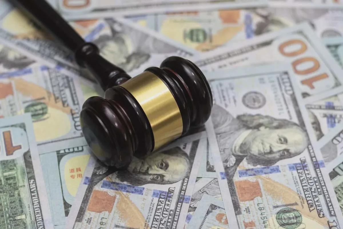 Wooden gavel on a desk symbolizing a class action lawsuit