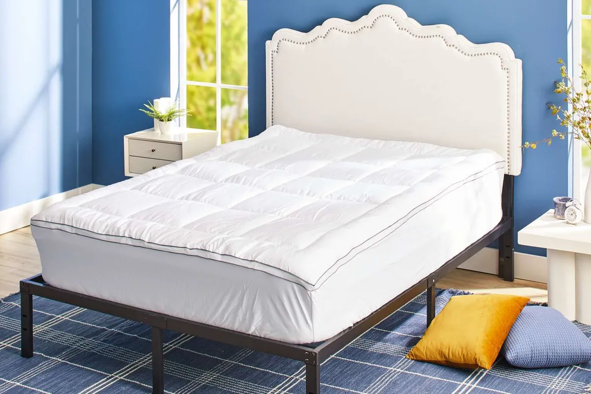Thick memory foam mattress topper showing density and structure