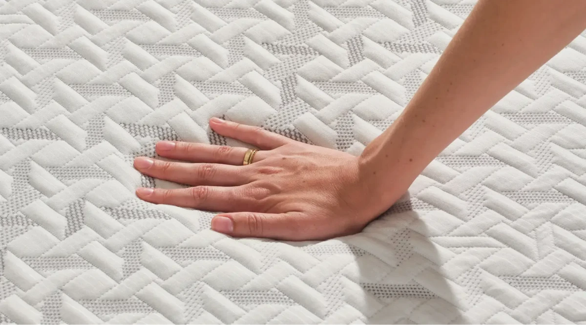 Close-up of a Nectar mattress cover and zipper, with the federal law label visible