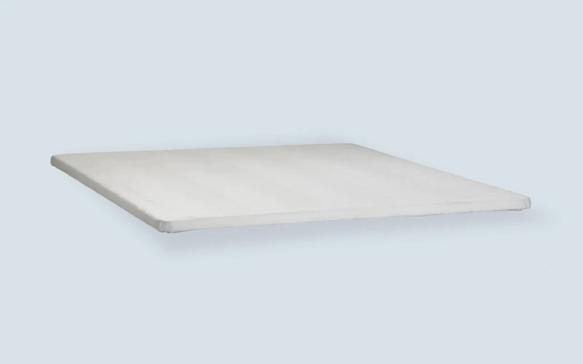 Wooden bunkie board placed on a bed frame before the mattress