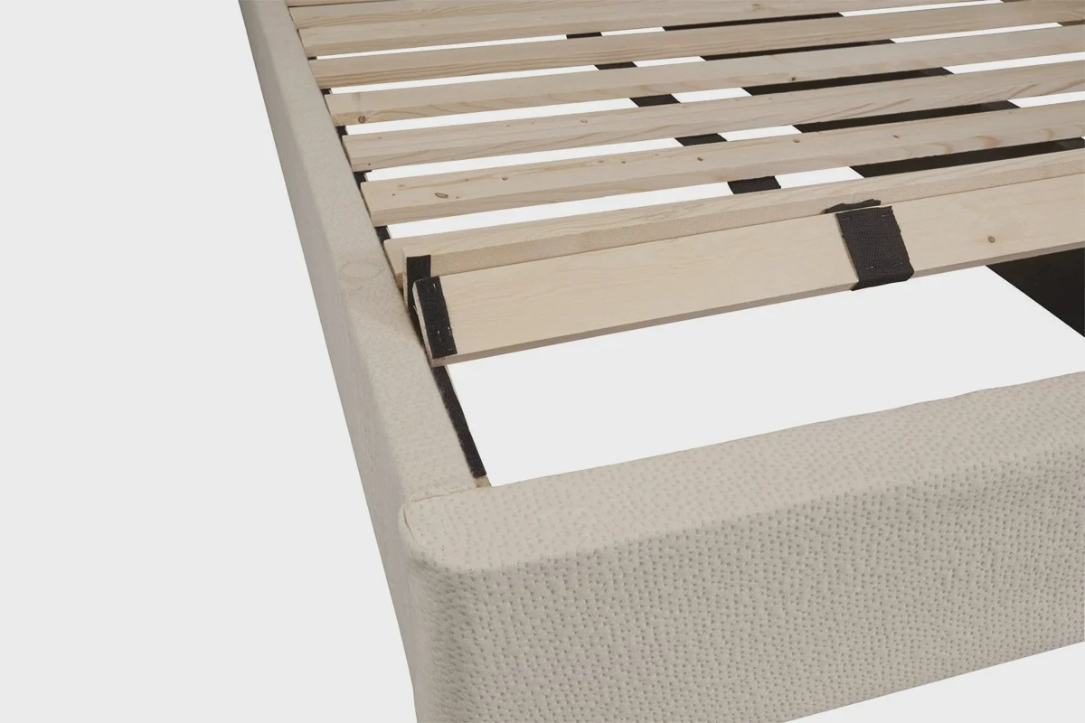 Velcro strips applied beneath mattress slats to lock a mattress in place