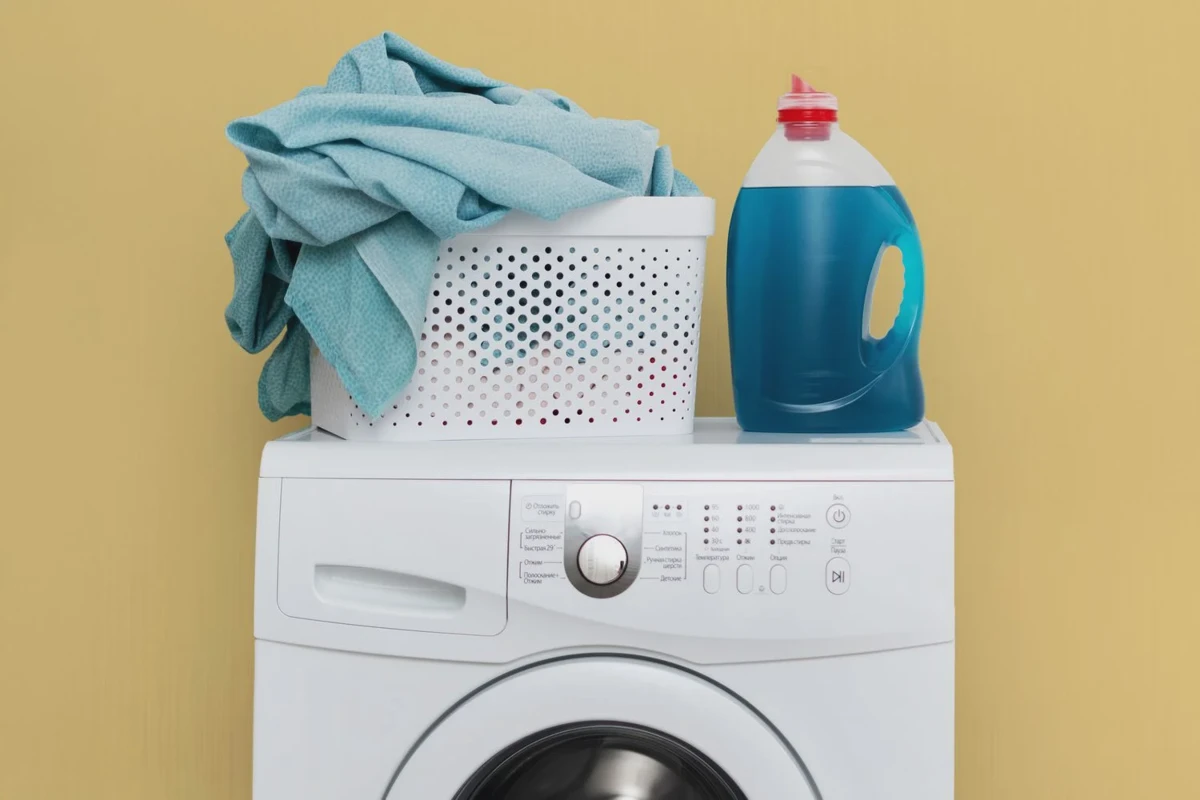 Bed sheets being washed in hot water in a washing machine