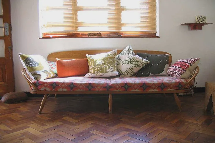 Daybed-style trundle frame styled as a couch by day