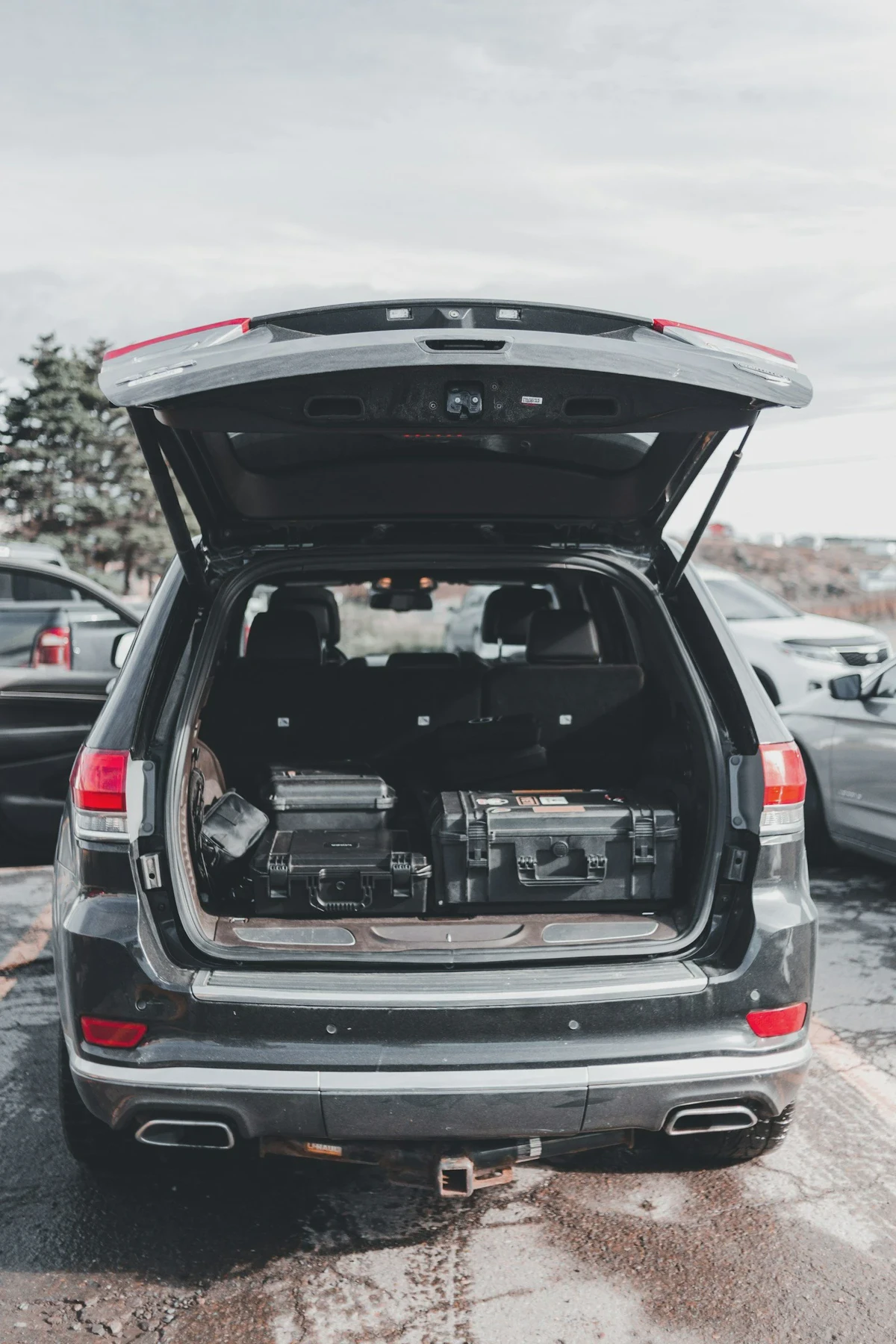 SUV with rear seats folded flat to make a long cargo bay