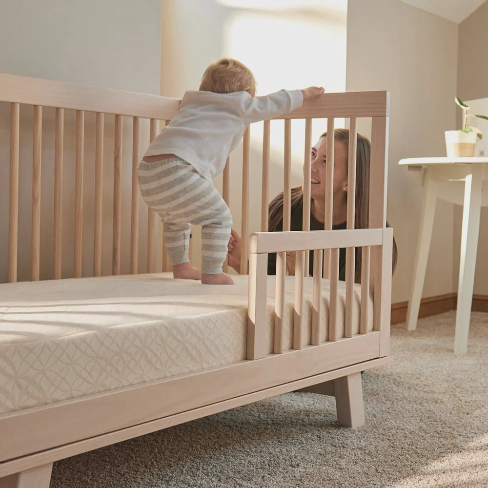 A breathable organic crib mattress in a nursery