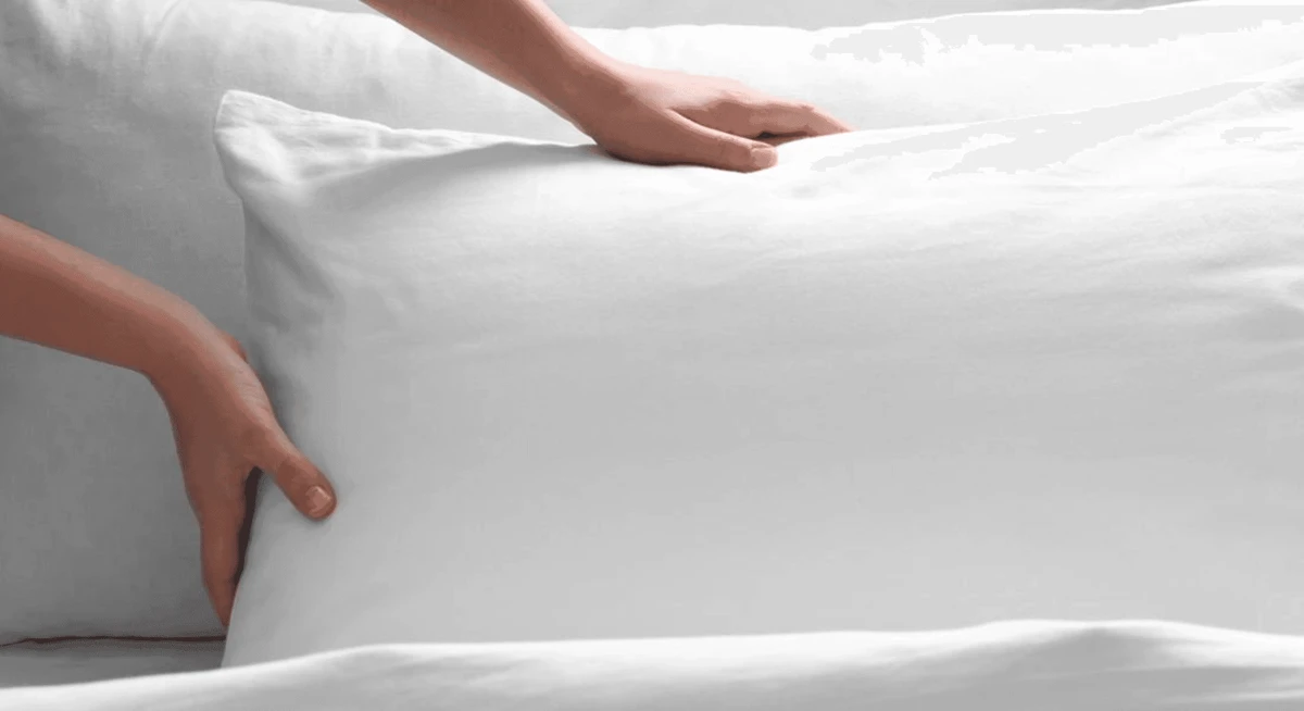 Fluffing pillows in a dryer with tennis balls