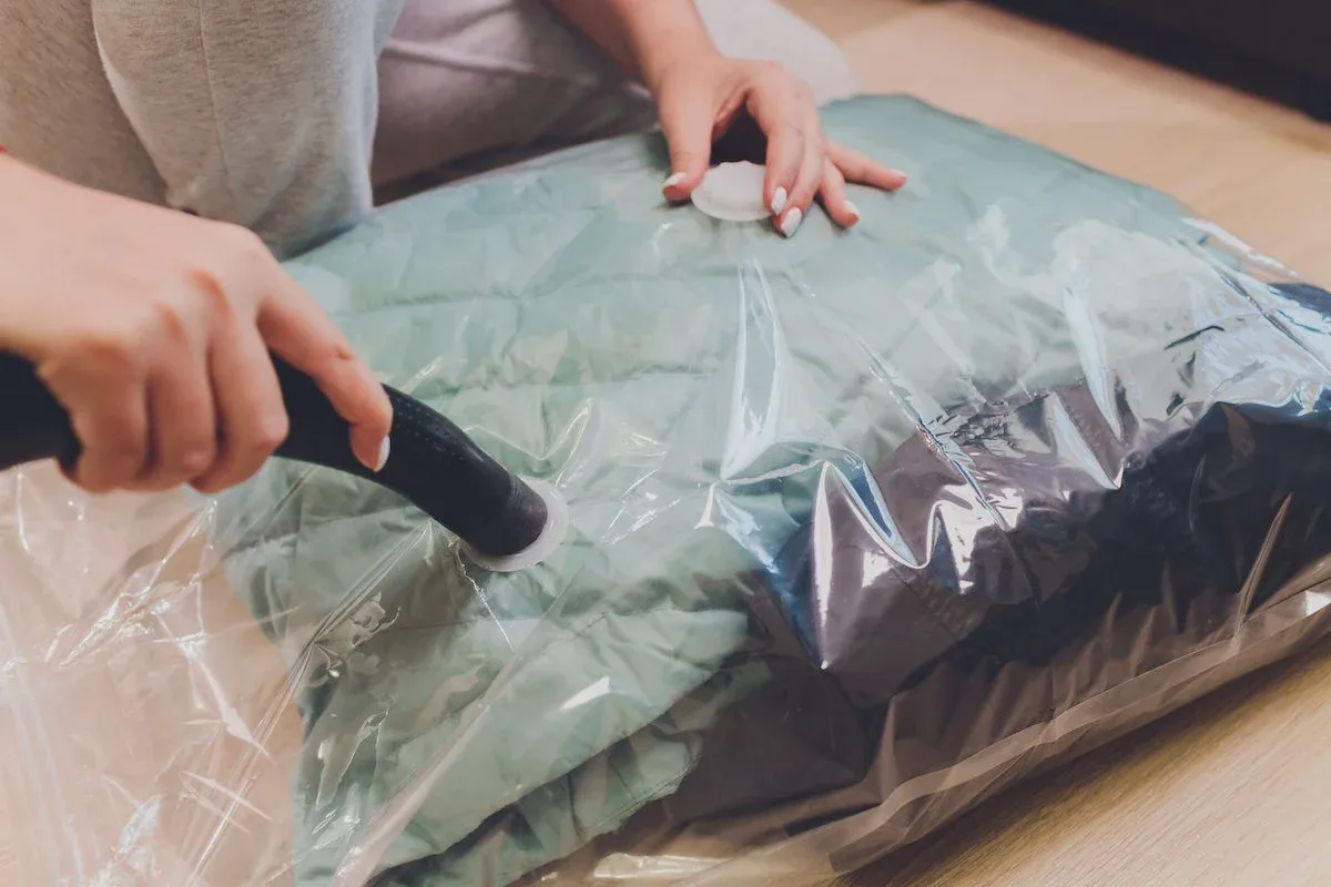 Bedding compressed in a vacuum-seal storage bag