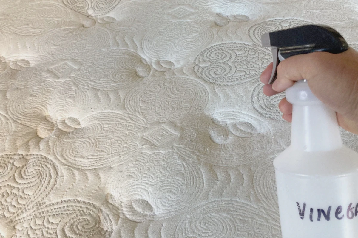 Light mist of diluted rubbing alcohol on a mattress, the safe spot-cleaning technique