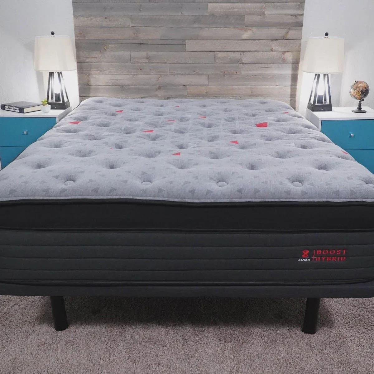 Zoma Boost hybrid mattress profile view showing the 15-inch height and zoned coil layer