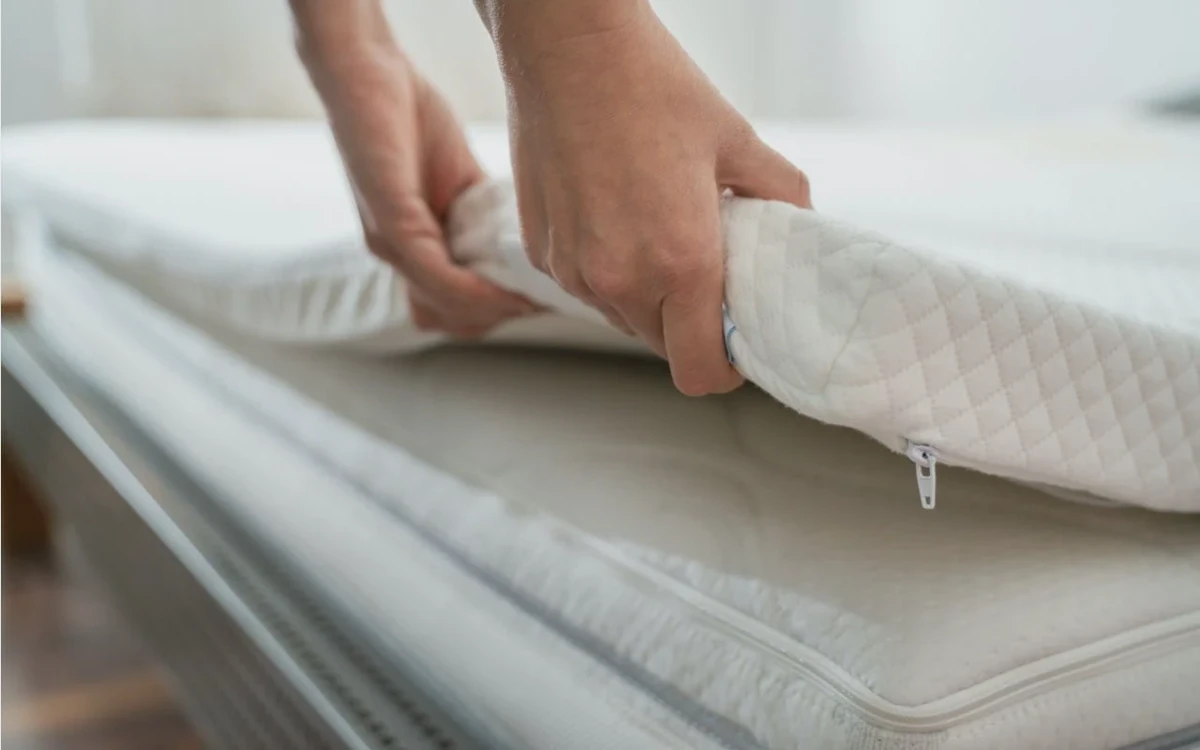 Worn mattress edge showing loss of support