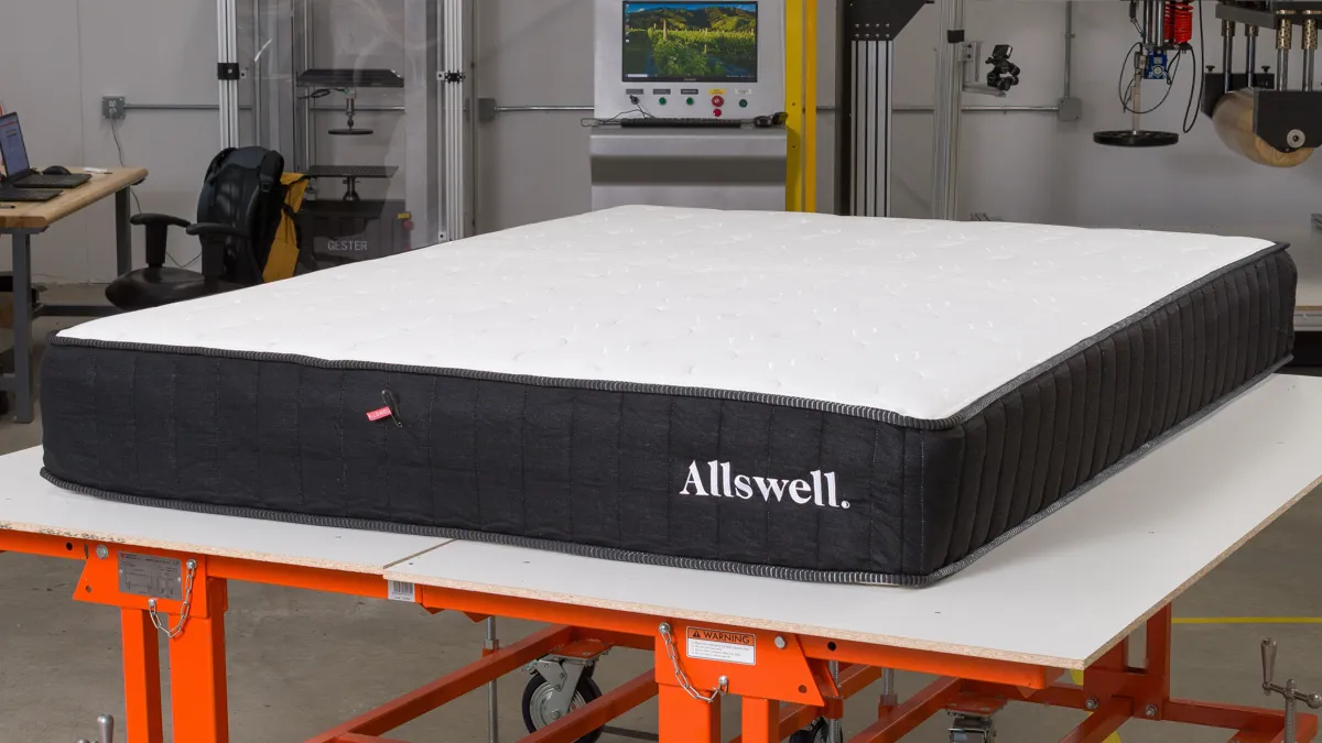 Cross-section view of the Allswell hybrid mattress showing memory foam over pocketed coils