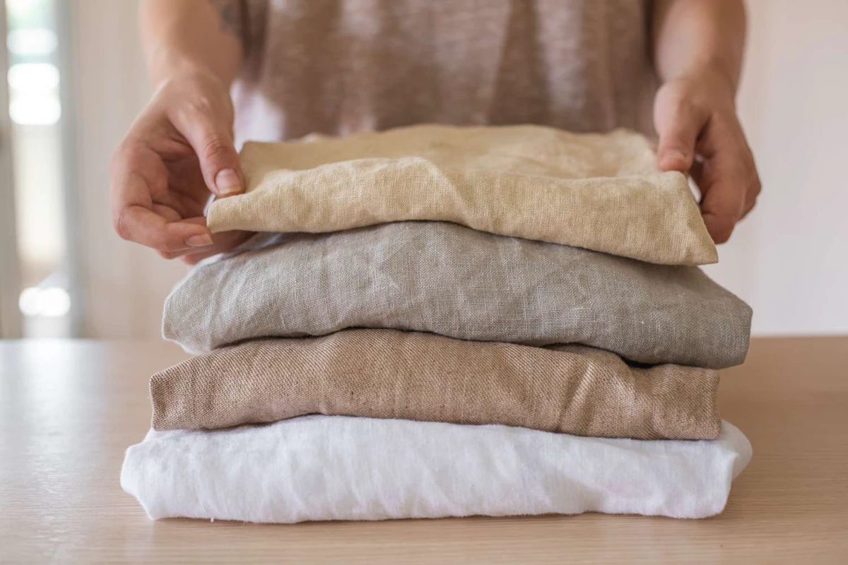 Linen and cotton fabric side by side, showing weave differences