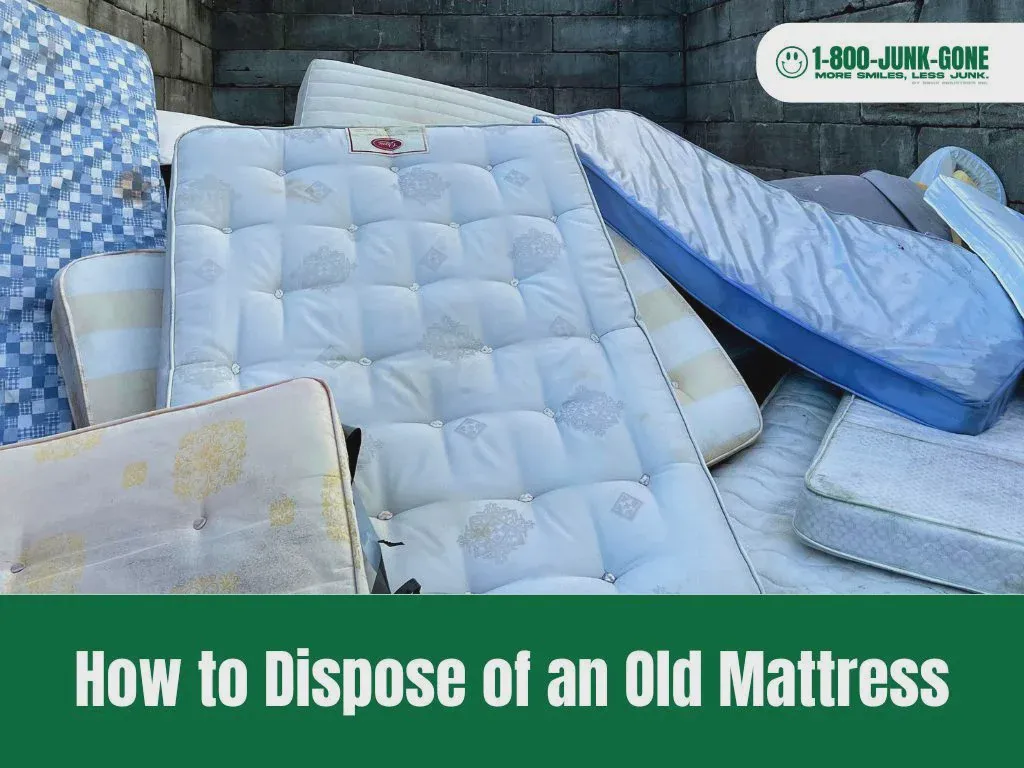 Delivery crew removing an old mattress during a new mattress delivery
