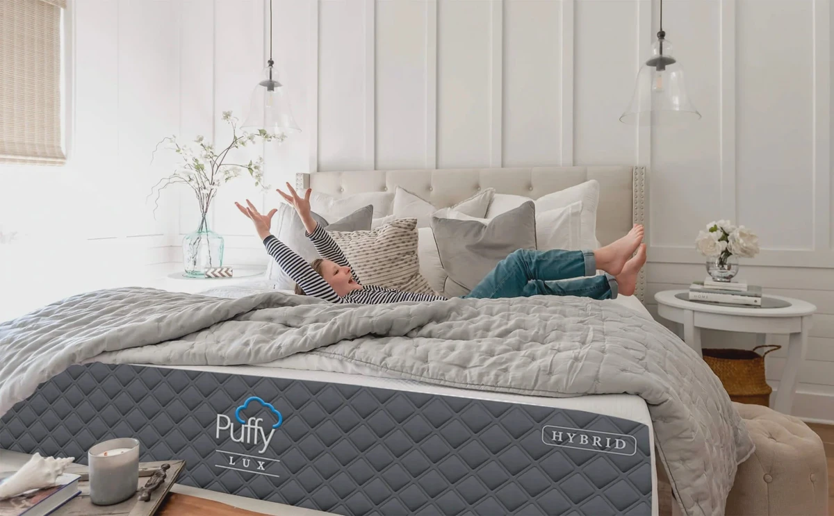 Puffy Lux Hybrid mattress in a styled bedroom